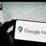 Stuttgart,,Germany,-,03-10-2023:,Person,Holding,Mobile,Phone,With,Logo